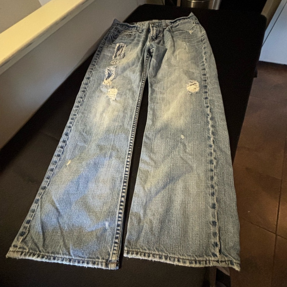 Low Rise Boot Cut Jeans. Size 28/28
